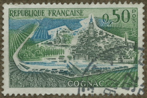 Ein Stempel mit einer Stadtansicht, die Gebäude, Bäume und Text zeigt.