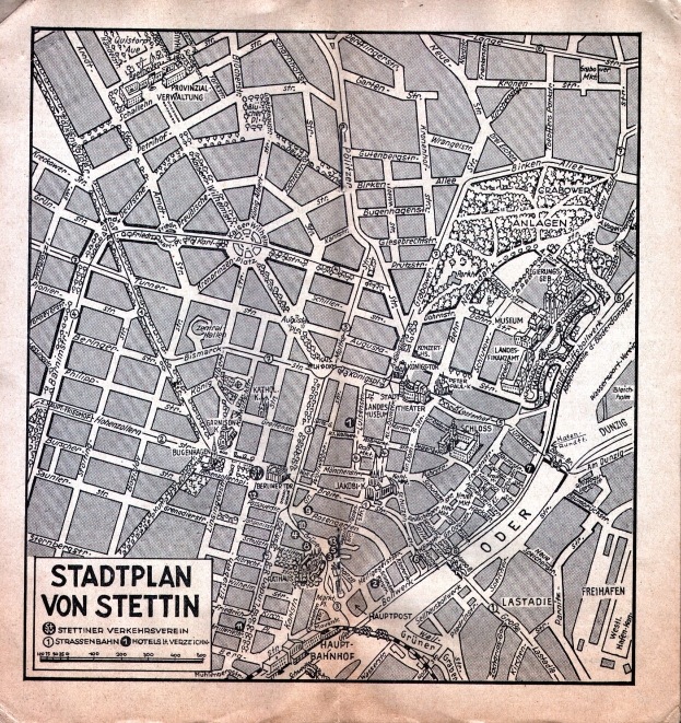 Ein detailliertes altes Stadtplan von Stuttgart auf Papier, der Straßen, Gebäude und Sehenswürdigkeiten zeigt, mit zusätzlichem Text, der Informationen bereitstellt.