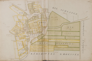 Ein altes Buch mit einer detaillierten Karte von Hamburg, Deutschland, mit sichtbaren Straßen, Gebäuden und Sehenswürdigkeiten, sowie Texten mit zusätzlichen Informationen zur Stadt.