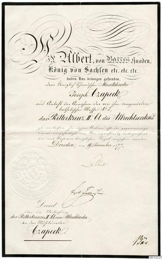 Ein altes Dokument mit schwarzem Rand und weißem Hintergrund, das den Text 'Ritterkreuz II, dresden, germany' und ein Logo zeigt, das die deutsche Regierung darstellt.